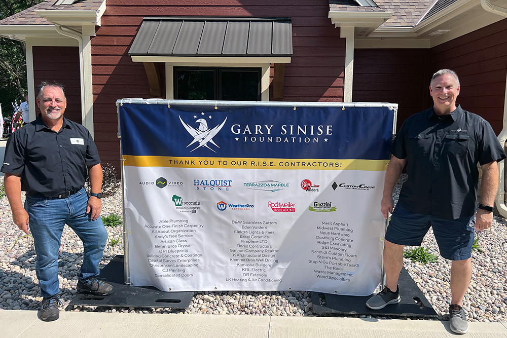Capt. Jason Church and his wife Bella at their new mortgage-free smart home